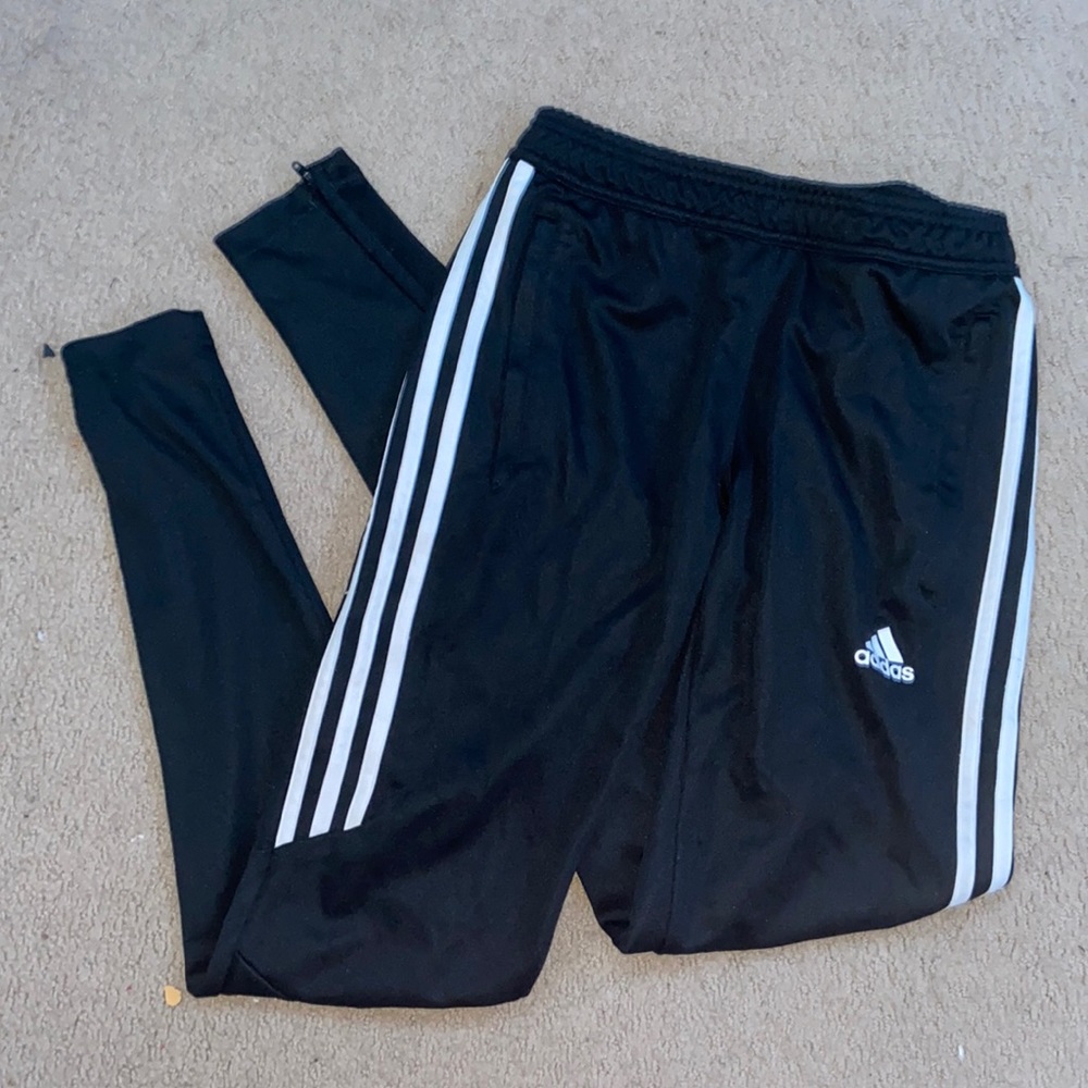 black adidas joggers with white stripes